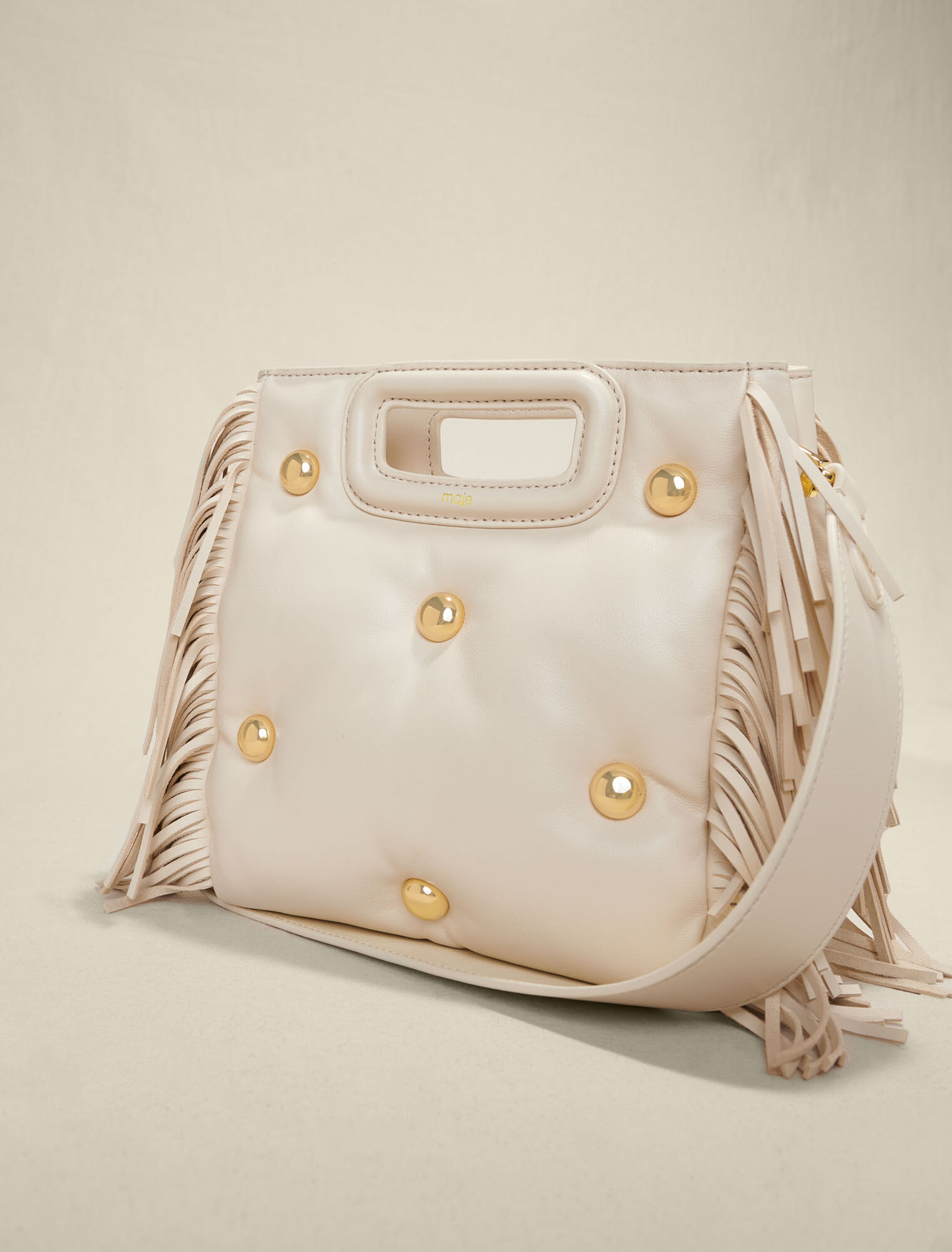 Leather M bag padded with studs