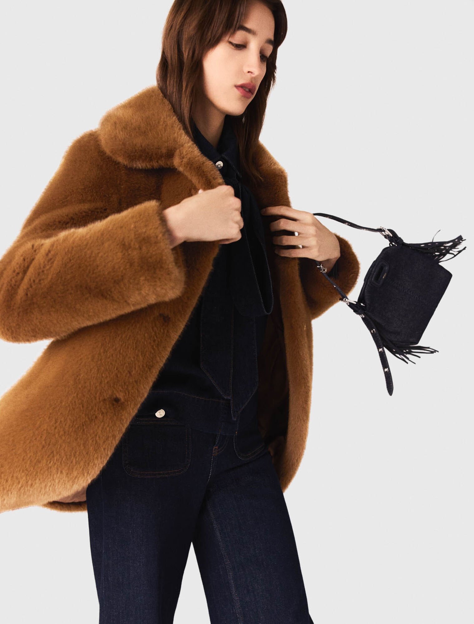 Manteau mi-long en fausse fourrure Manteau mi-long en fausse fourrure