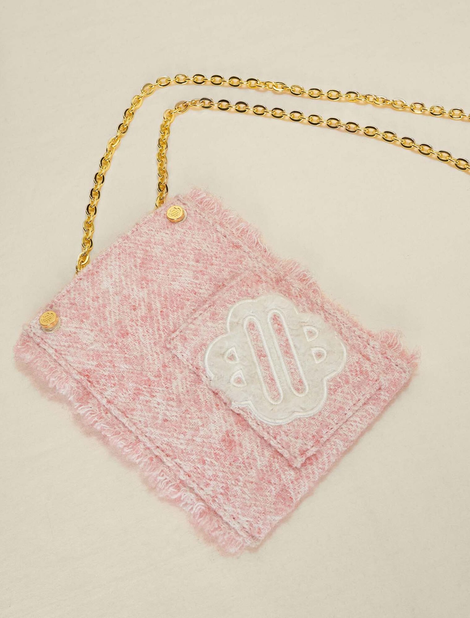 Pink tweed-effect phone bag