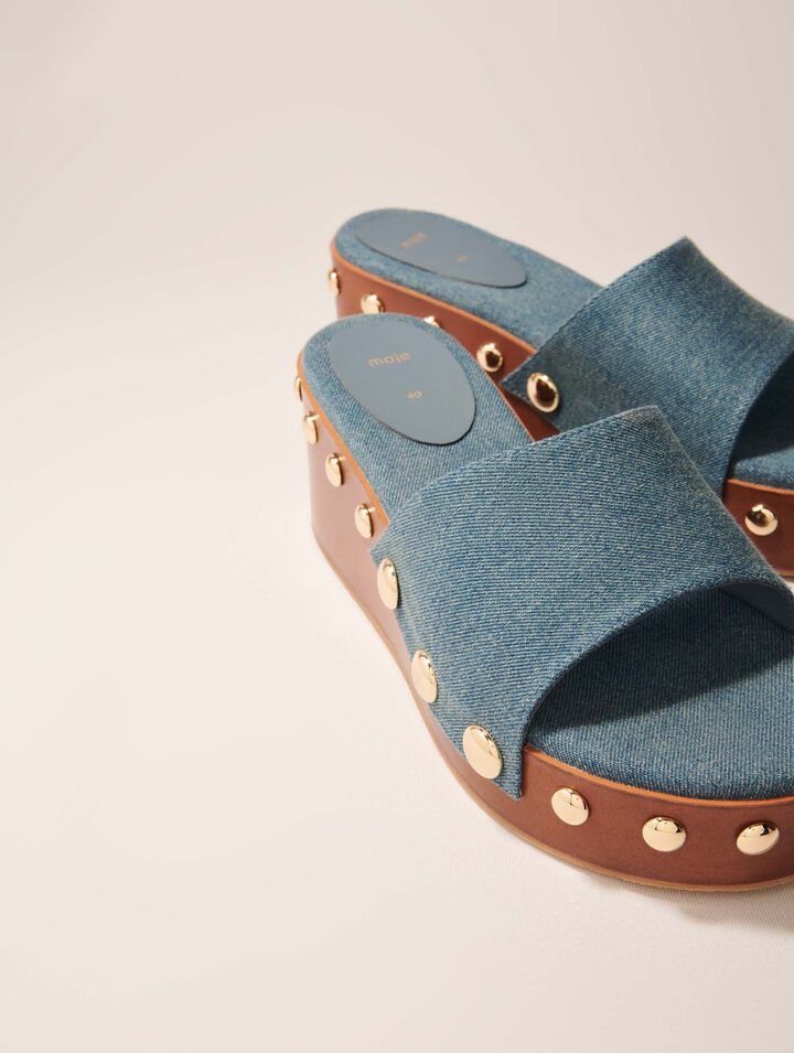 Mules compensées en denim à studs