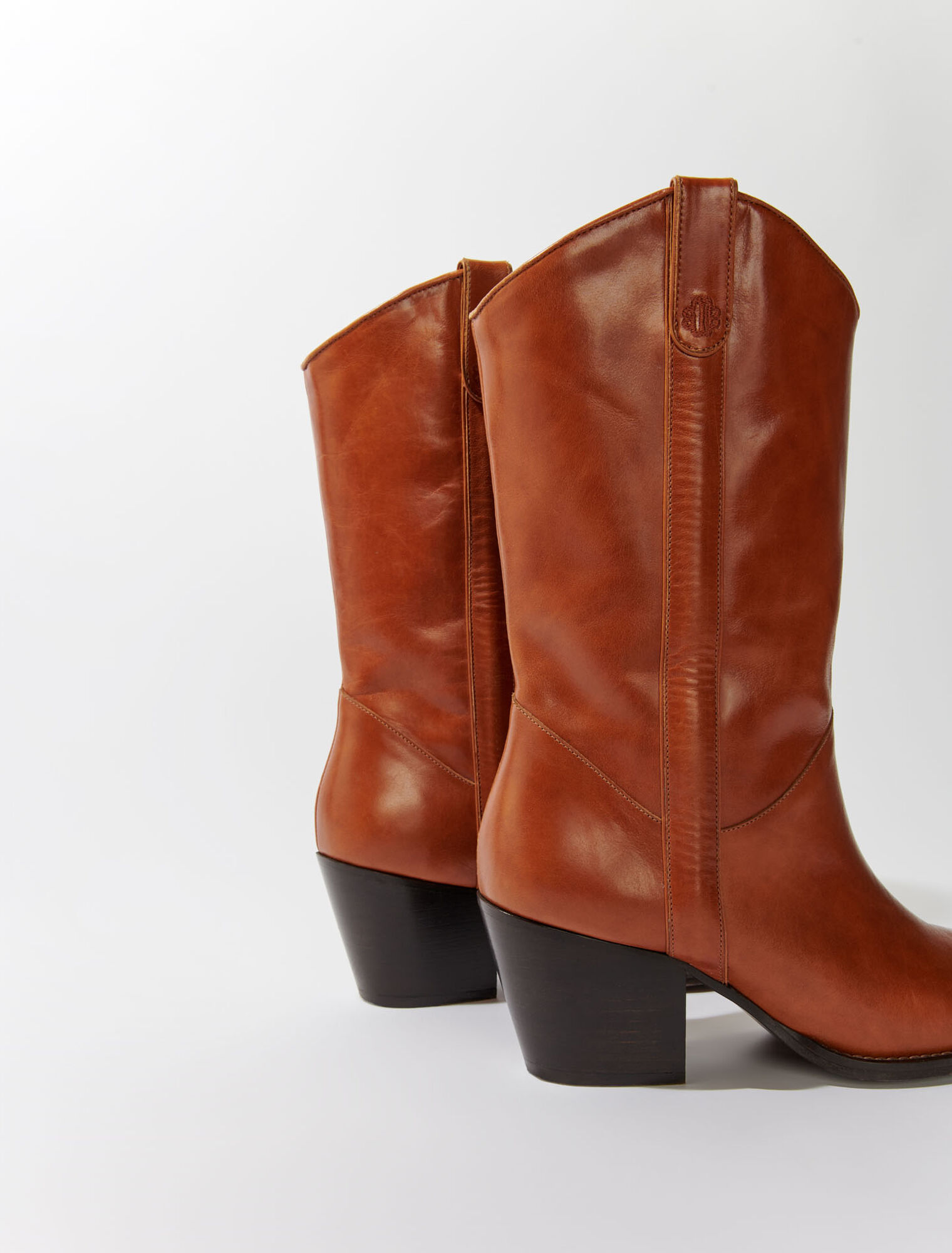 Heeled leather boots