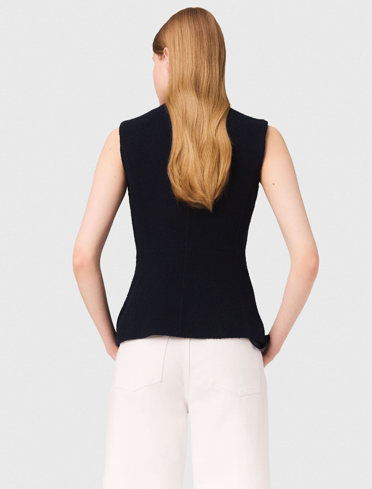 Sleeveless tweed jacket