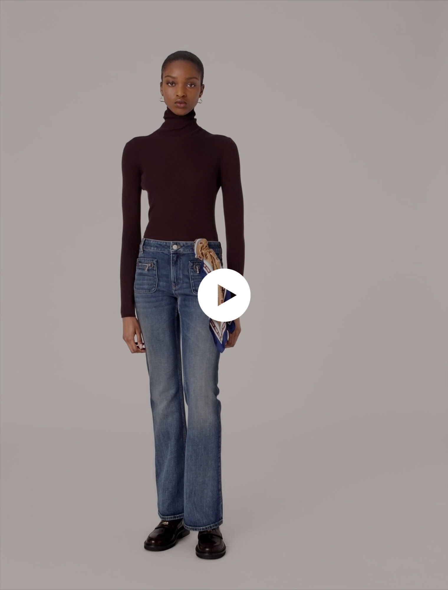 Jean bootcut à poches zippées