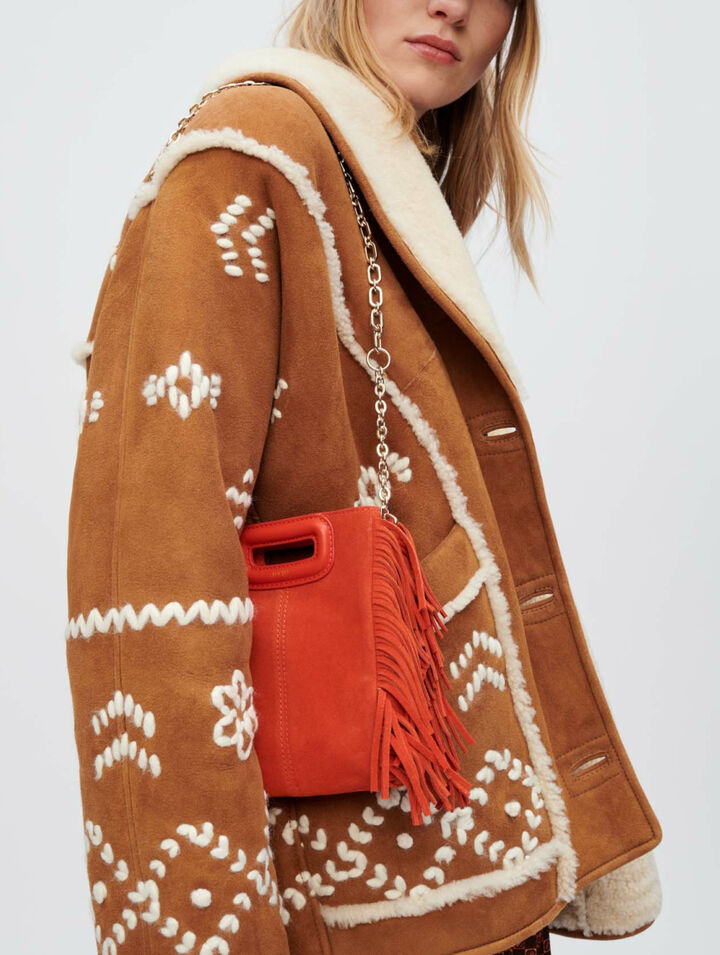 Manteau en peau de mouton lainée