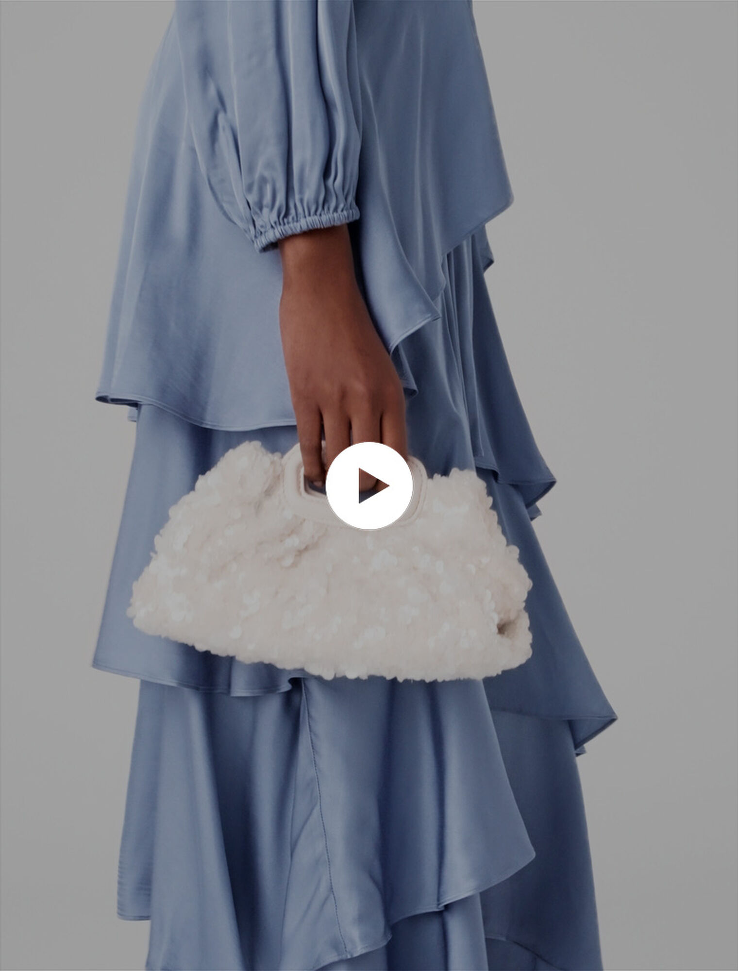 Milpli mini Clutch en sequins